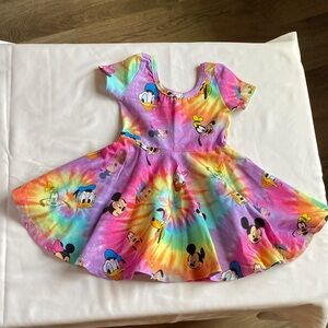 Wild Rich Kids character heads tie dye